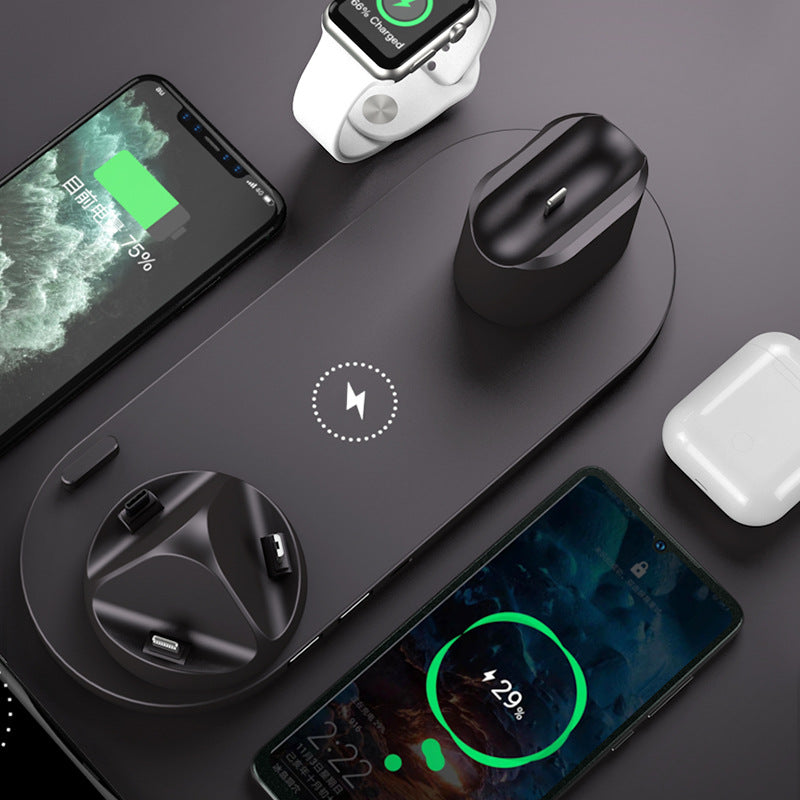 6-in-1 wireless charger overhead flatlay - charges Apple Watch AirPods two phones simultaneously
