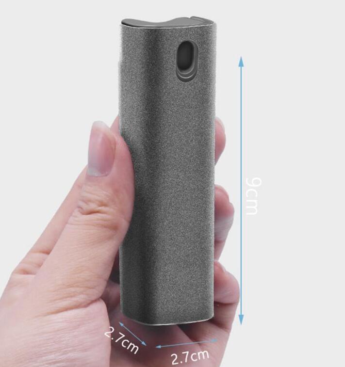 Applying screen cleaner spray to iPhone display - removing fingerprints